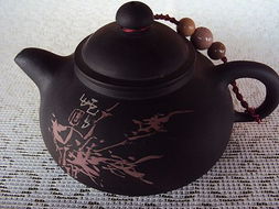 建水紫陶瑰宝 贝山陶壶、残帖茶壶与向炳成装饰艺术